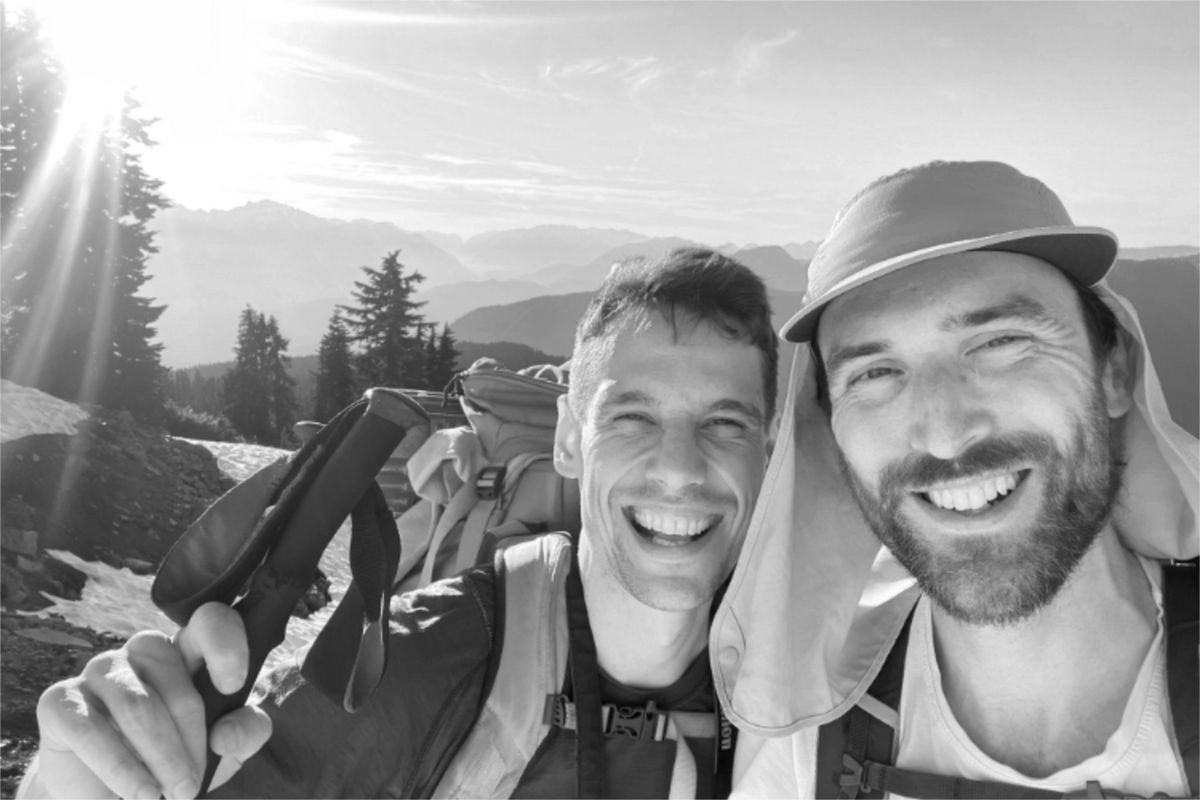 Two Adventure Andy team members smiling outdoors