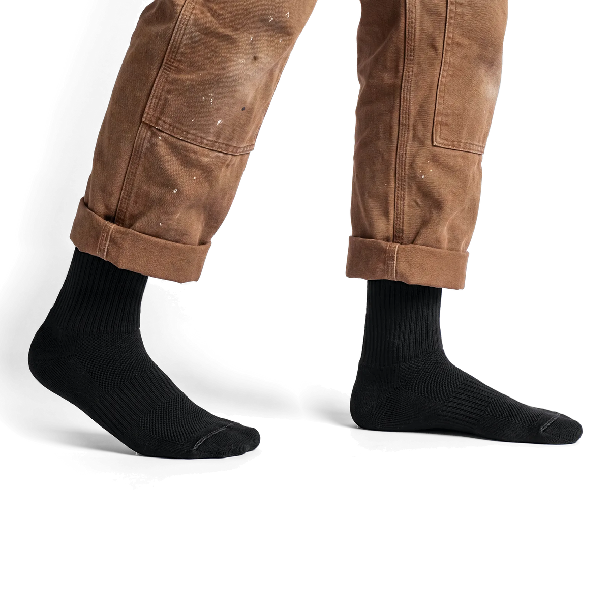Black Merino Boot Socks worn with canvas work pants, side view