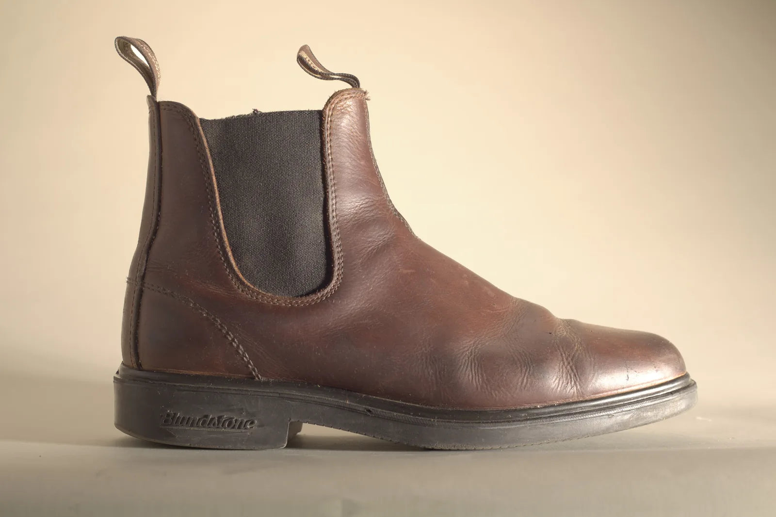 The same boot after 2-in-1 Boot Wax, with darker, even brown leather